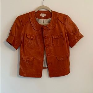 Orange leather short sleeve jacket